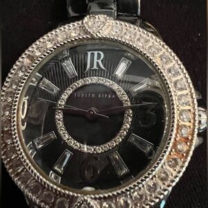 Judith Ripka black ceramic watch w:Arabic numbers at 3, 6, and 9